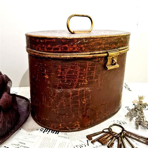 how old are metal hat boxes|decorative vintage hat boxes.